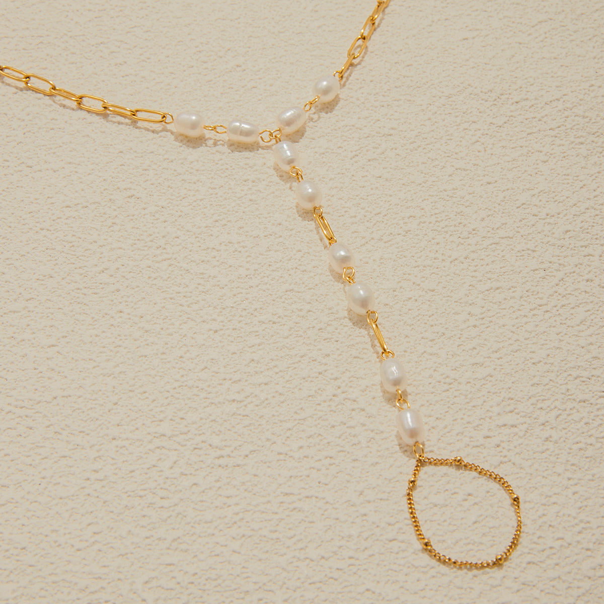 Isola Pearl Hand Chain Ring