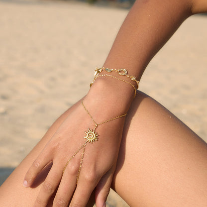 Solstice Sun Charm Hand Chain Bracelet