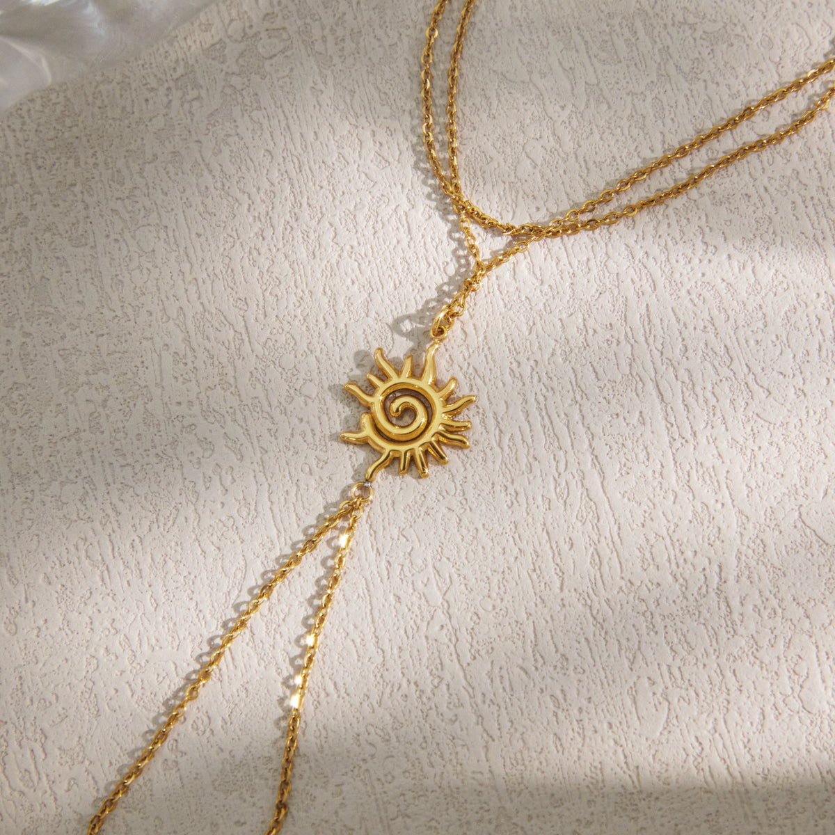 Solstice Sun Charm Hand Chain Bracelet