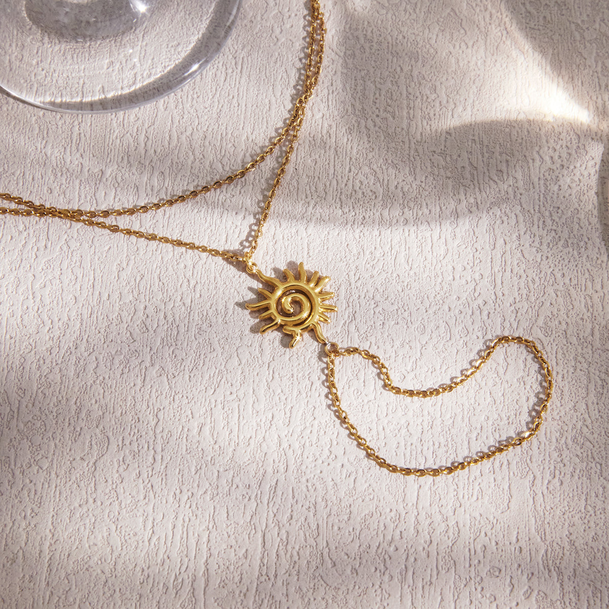 Solstice Sun Charm Hand Chain Bracelet
