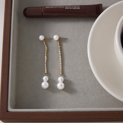 Vela Long Pearl Tassel Earrings