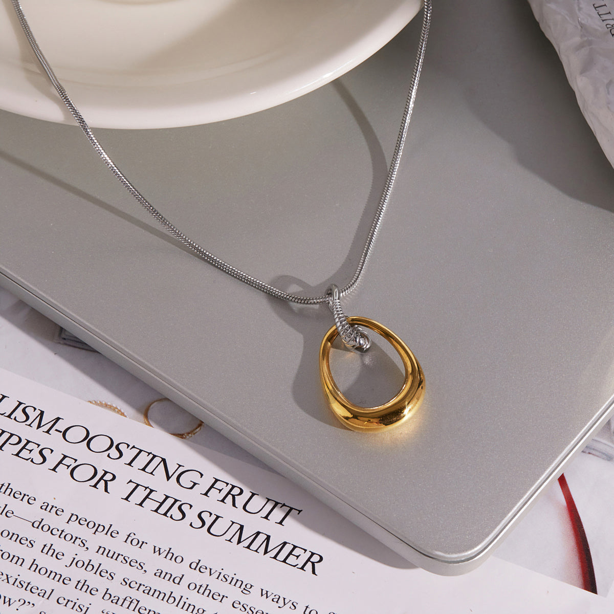Marea Two Tone Twisted Drop Necklace