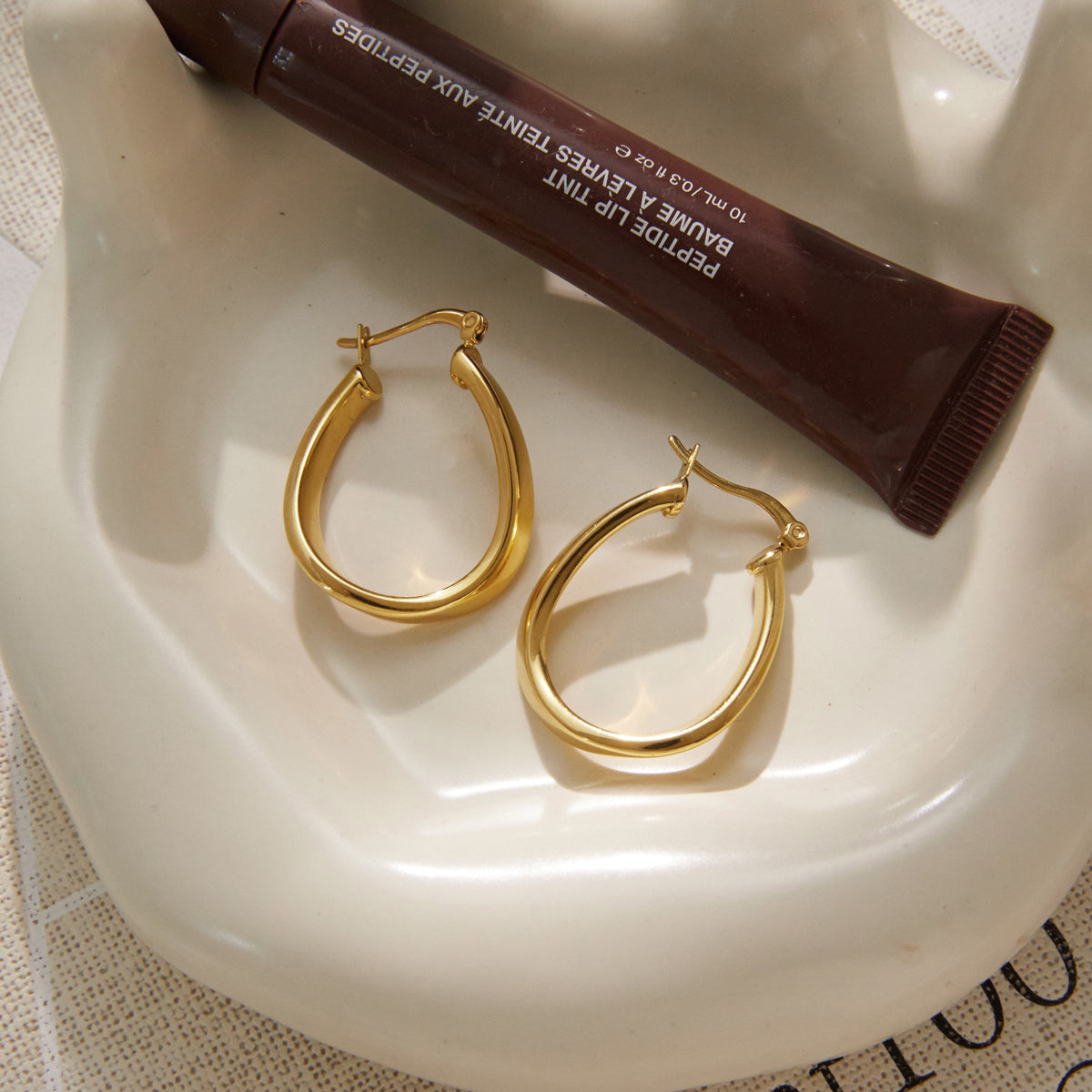 Mistral Twisted Teardrop Hoop Earrings