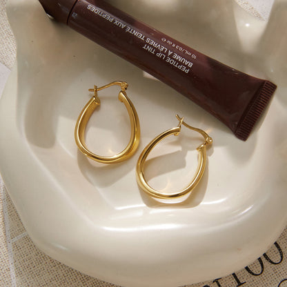 Mistral Twisted Teardrop Hoop Earrings