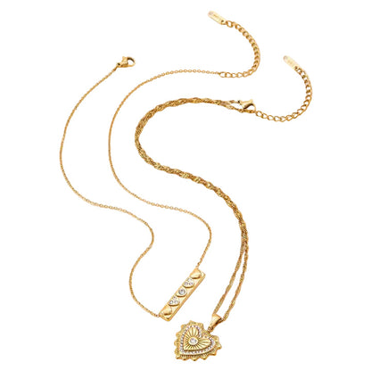 Lumen Ribbed Heart Medallion Necklace