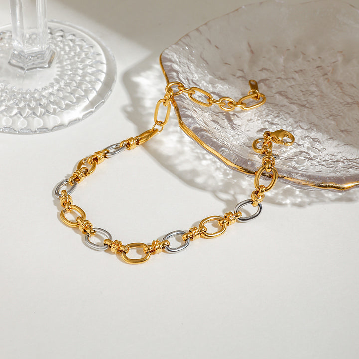 Ponent Silver and Gold Chain Bracelet
