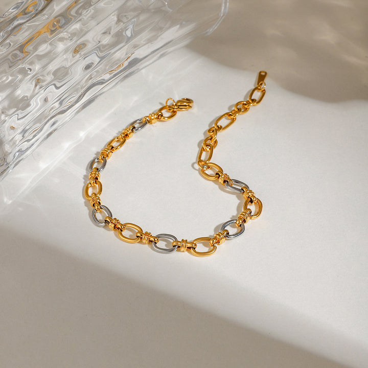 Ponent Silver and Gold Chain Bracelet