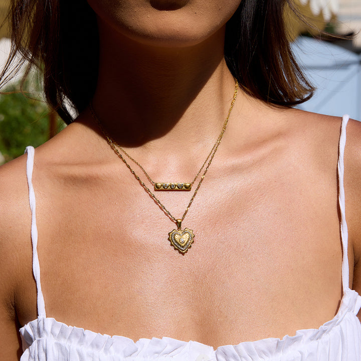 Lumen Ribbed Heart Medallion Necklace