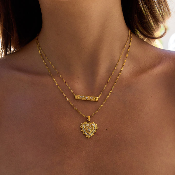 Lumen Ribbed Heart Medallion Necklace