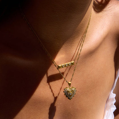 Lumen Ribbed Heart Medallion Necklace