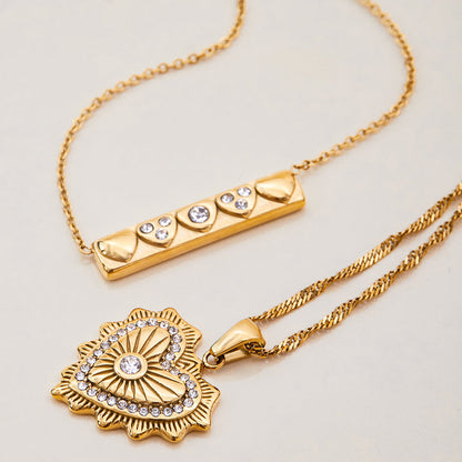 Lumen Ribbed Heart Medallion Necklace