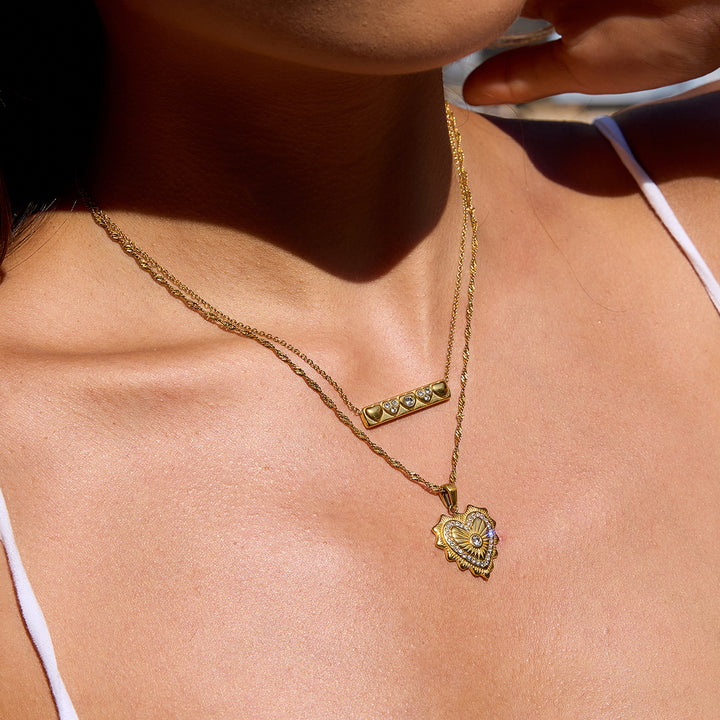 Lumen Ribbed Heart Medallion Necklace