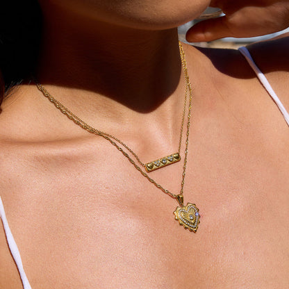 Lumen Ribbed Heart Medallion Necklace
