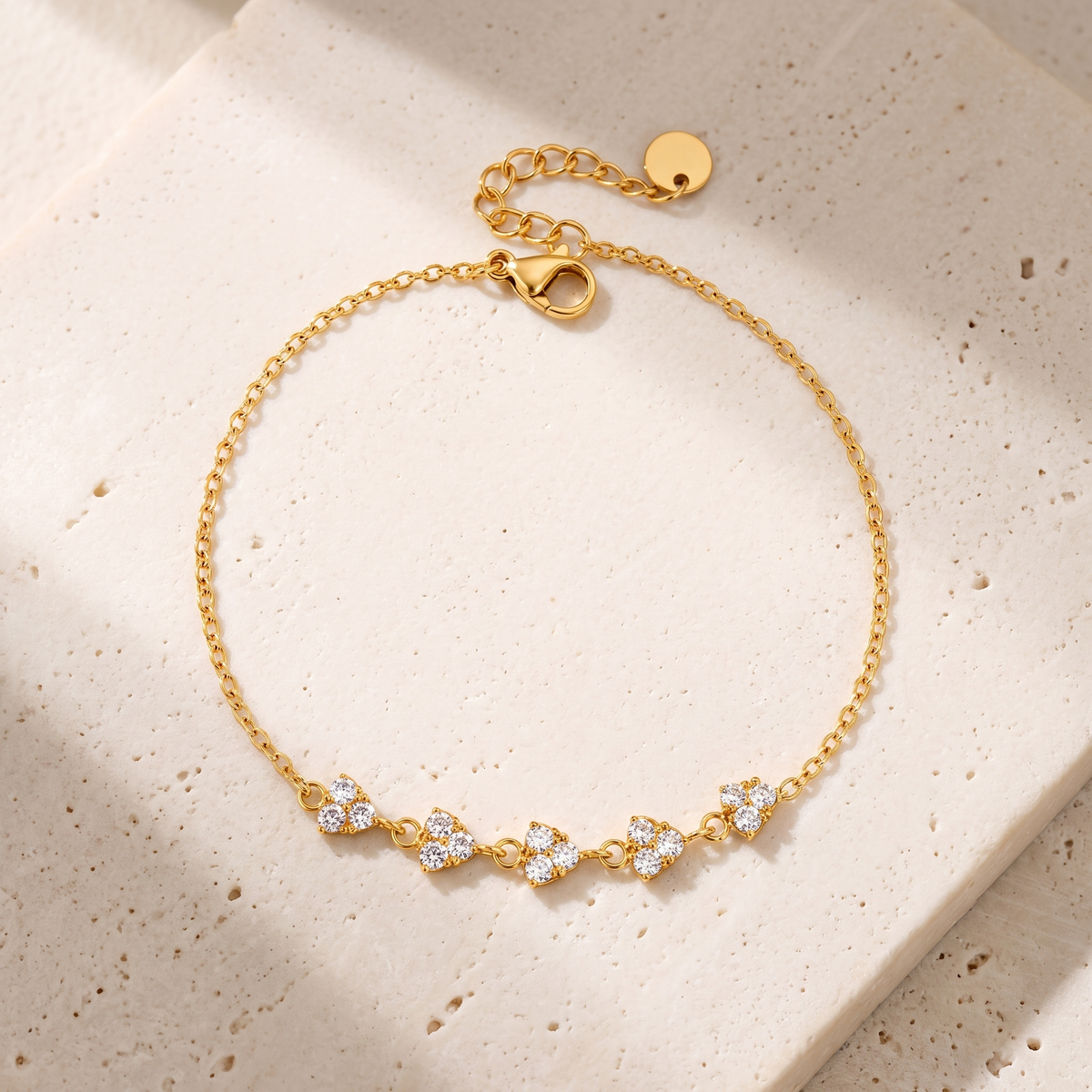 Mimosa Clover Trefoil Bracelet on travertine